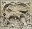 Panel 13:09 - Bird picking at carrion ? (lower part quite eroded)